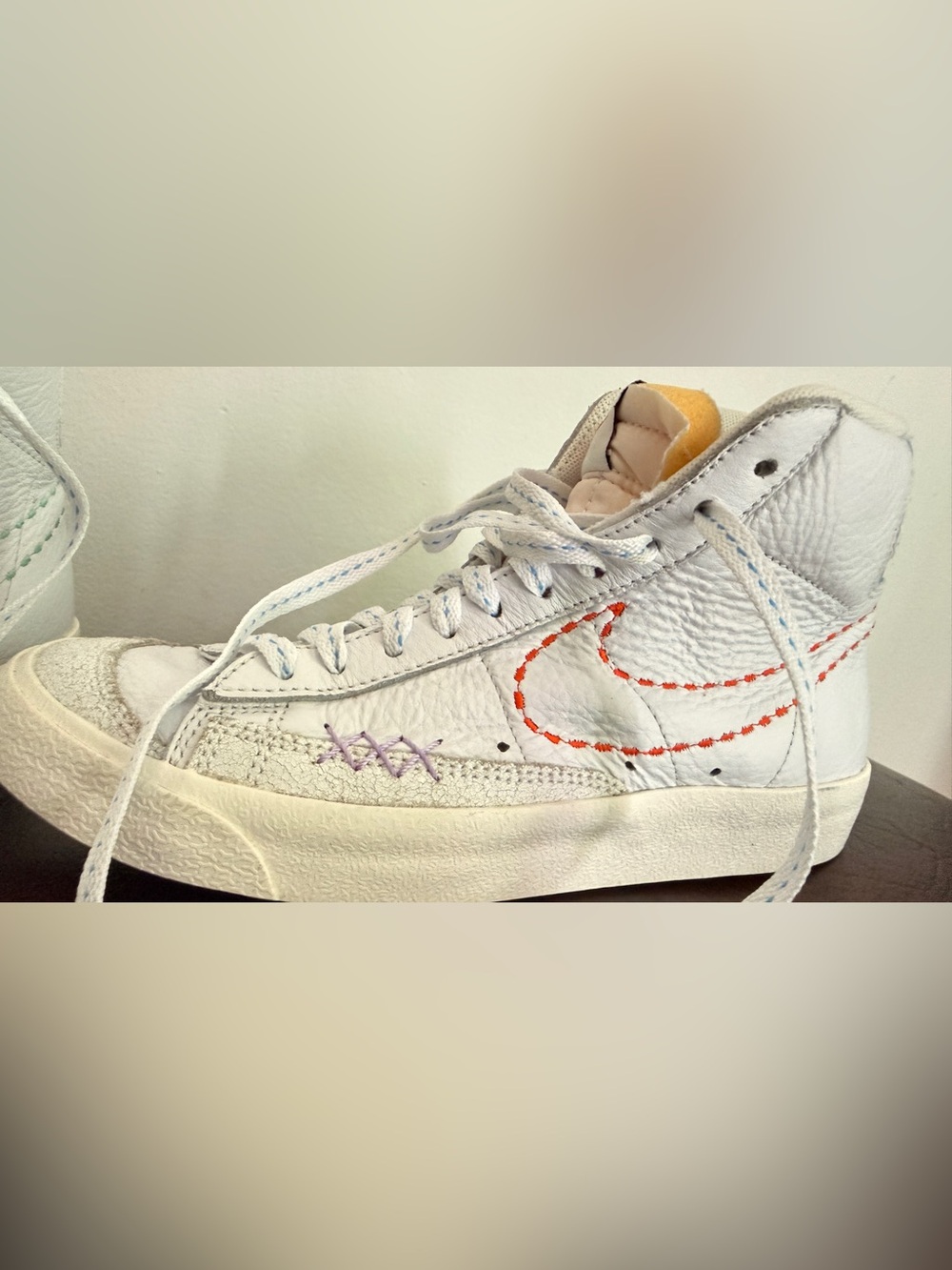 Nike White Shoe Tag with Black Swoosh Detail